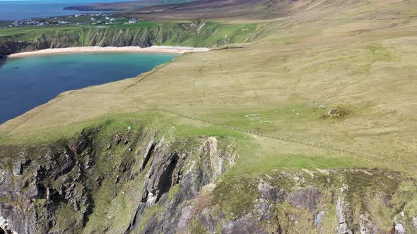 Aerial View of the Beautiful Coast at Malin Beg with Slieve League in the Background in County alt