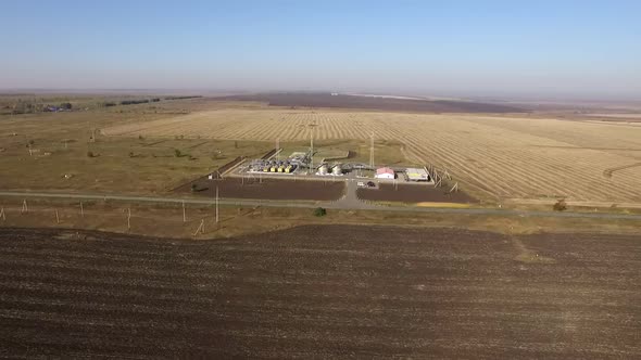 Oil Pumping Station in Field in Russia, Aerial View in Summer Day