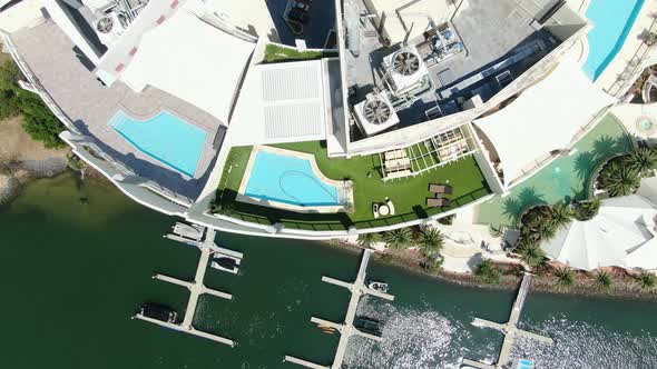 Vertical fly over luxury apartment building,clear bright summers day alt
