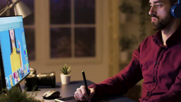 Professional Photographer Listening Music on Headphones alt