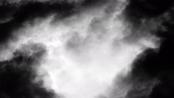 4k gray cumulonimbus dark cloud and lightning flashed alt