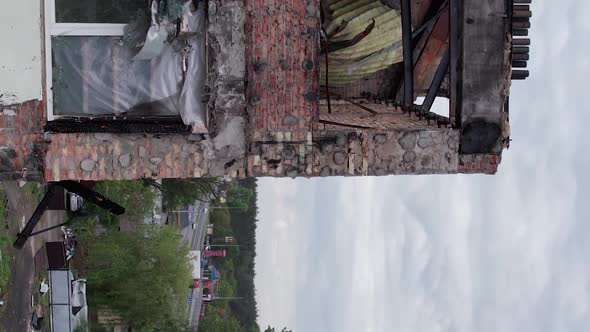 Vertical Video of a Wartorn Apartment Building in Ukraine alt