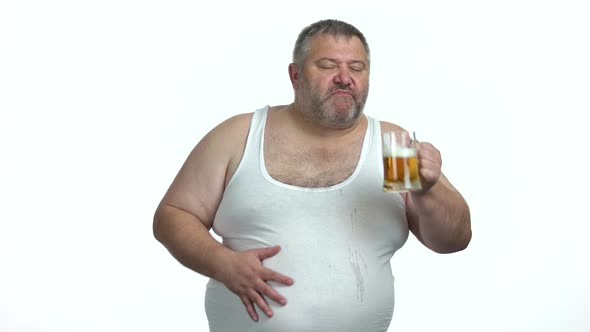 Happy Man Drinking Beer on White Background, Stock Footage | VideoHive