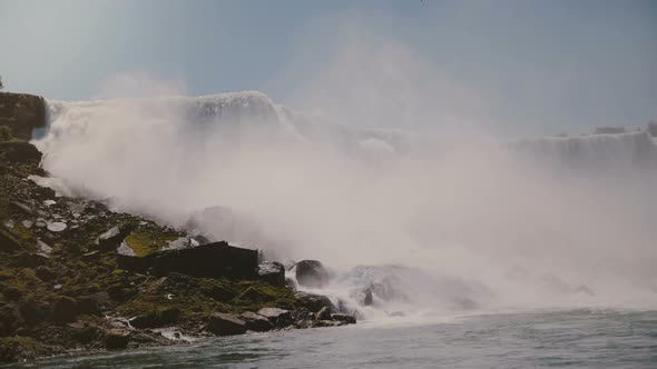 Scenic Slow Motion Background Shot of Epic Waters Rushing Down at Amazing Niagara Falls Waterfall alt