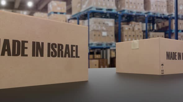 Boxes with MADE IN ISRAEL Text on Conveyor alt