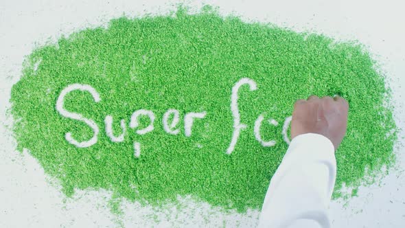 Indian Green Hand Writes On Green Super Foods