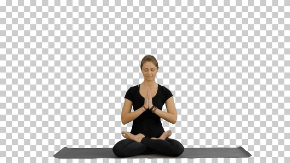 Sporty attractive woman practicing yoga, Alpha Channel