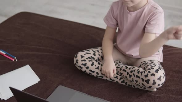 Preschooler Girl Uses Laptop