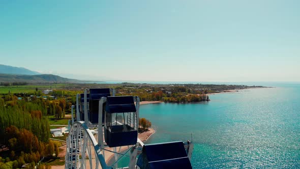 Drone Footage on Ferris Wheel at the Beach
