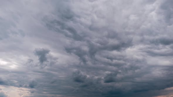Timelapse of Gray Cumulus Clouds Moves in Blue Dramatic Sky Cirrus Cloud Space alt
