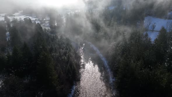 Winter sunrise by the river alt