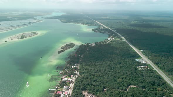 The different amazing colors of the Bacalar lagoon seen from the sky alt