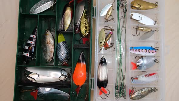 Fishing box with spoons and metal baubles, equipment for fishing with spinning