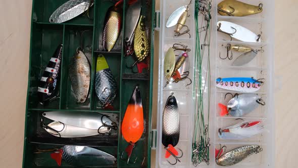 Fishing box with spoons and metal baubles, equipment for fishing with spinning alt