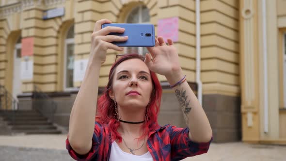 Woman Makes a Selfie