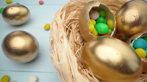 Easter Egg with Colorful Candies in a Basket Close Up