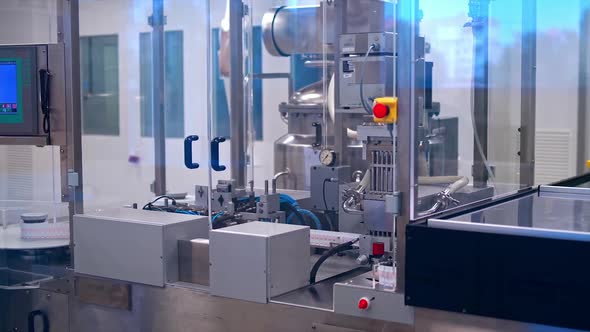 Pharmacy medicine pill production background. Pharmaceutical machinery for medicine production pills alt