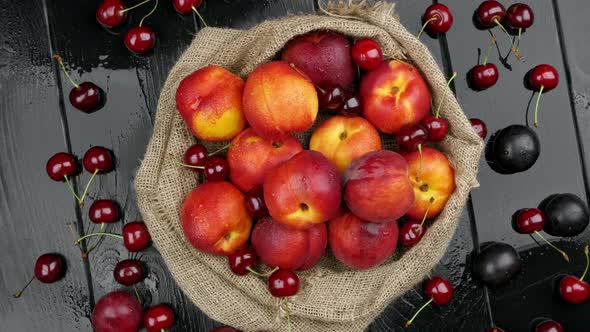 Nectarines Sweet Cherries Blueberries on a Wooden Table Autumn Fall Harvest in Summer alt