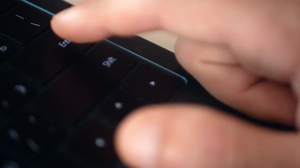 Shooting Up Close As the Finger Presses the Enter Button