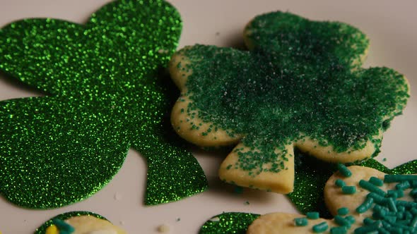 Rotating stock footage shot of St Patty's Day clovers on a white surface - ST PATTYS 010 alt