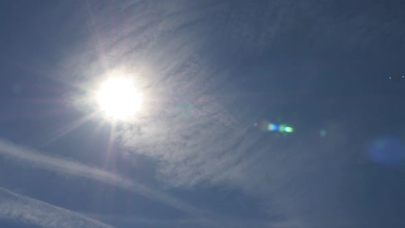 Soap bubbles flowing against blue sky and sun 1080p FullHD slow-mo footage - Slow motion soap bubble alt