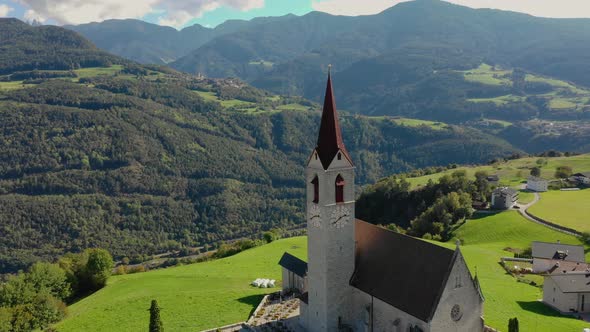 A Bird's-eye View of the Church and the Valley Near the Village of Velturno. Dolomites. Autumn Italy