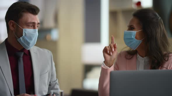 Couple Business People Talk Wear Face Protection in Financial Workplace Office alt