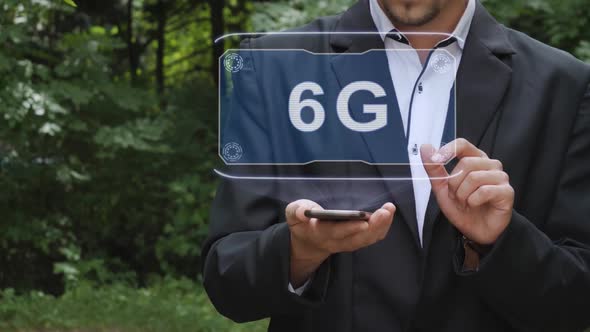 Businessman Uses Hologram with Text 6G