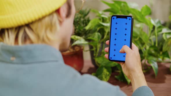 Florist Man Using Smartphone with Chroma Key alt