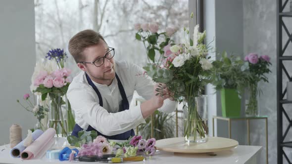 Entrepreneur Male Florist Loving Job Carefully Selects Flower Composition for Sale in Modern alt