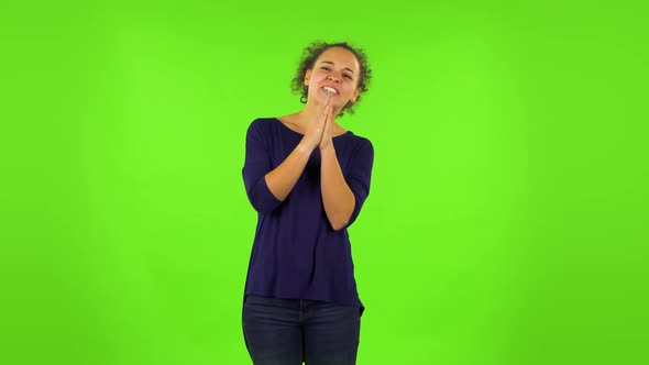 Curly Woman Keeping Palm Together and Asking for Something. Green Screen alt