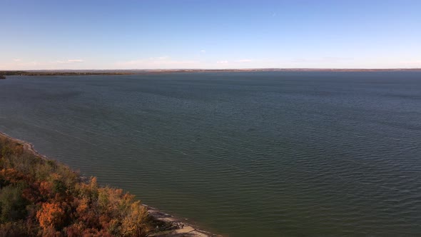 4k cinematic aerial footage from high above buffalo lake in Alberta's prairies. Sunny autumn days in alt