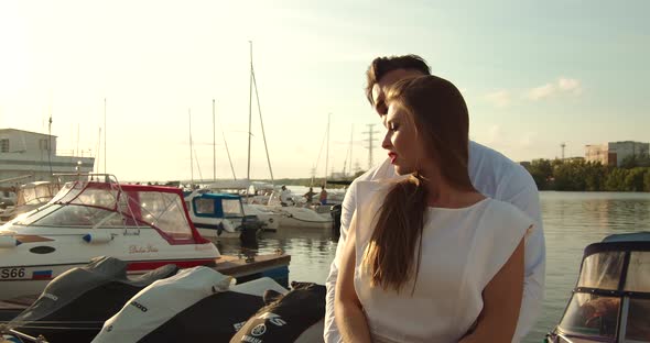 Romantic Couple Having Date on Embankment at Sunset