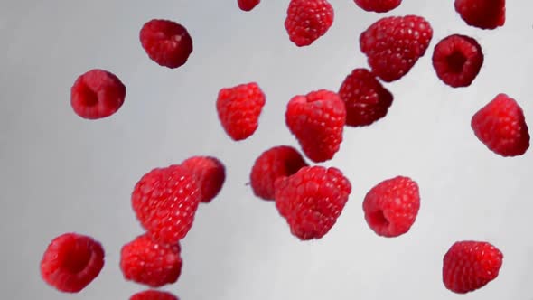 Ripe Red Raspberries Fly in the Air, Stock Footage | VideoHive