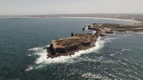 Rocky cliffs along Peniche coast in Portugal. Aerial panoramic view