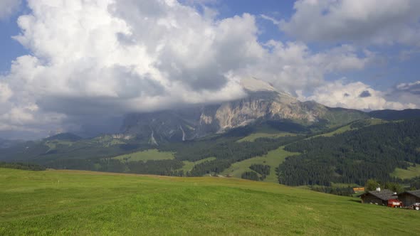 Aerial Drone video of the Sassolungo mountains on the Italian Alps Dolomites alt