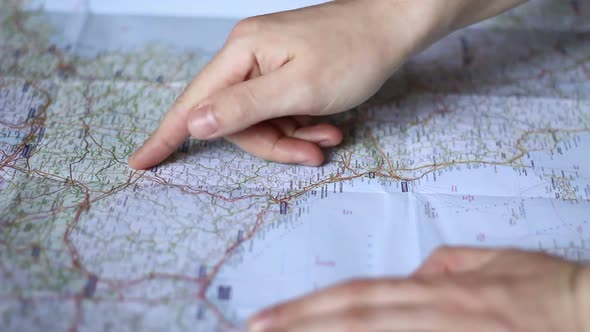 Looking At A Route On A Map