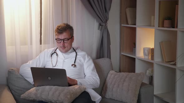 End Working Day Male Doctor Online Communication alt