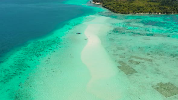 Sandy Beach in the Lagoon with Turquoise Water alt