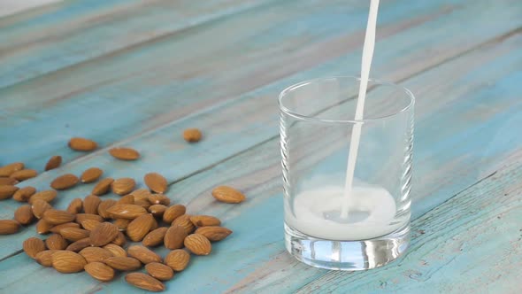Almond Milk is Poured Into a Glass