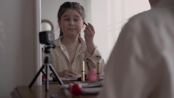 Girl Child Blogger Broadcasts Live Online and Writes Blog About Teen Makeup and Cosmetics alt