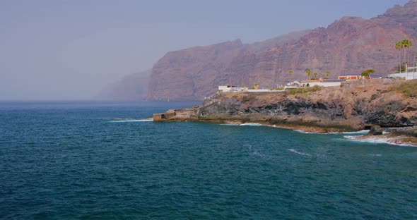 View of the Cliffs of Los Gigantes Tenerife From Coastline Atlantic Ocean alt