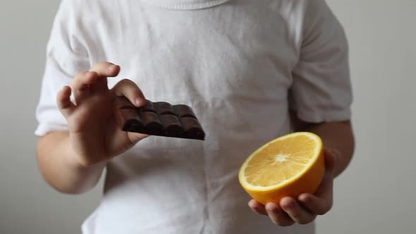 Child choose. Healthy and unhealthy food concept. alt