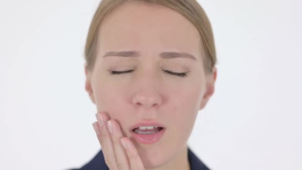 Face Close Up of Young Businesswoman Having Toothache alt