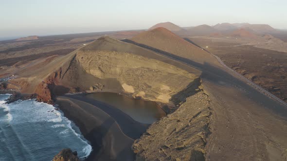 Aerial view of El Lago Verde, Yaiza, Lanzarote, Canary Islands, Spain. alt