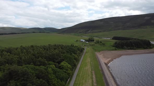 Lake And Lonely Village House Aerial View, Threipmuir, Balerno, Scotland alt