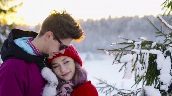 Happy Coulple in Love at Sunny Winter Day alt