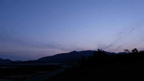Sunset over the Forested Mountains