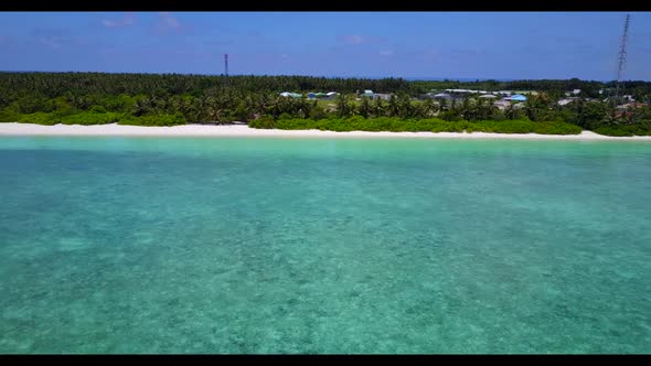 Aerial drone shot nature of tropical bay beach lifestyle by blue water with white sandy background o alt