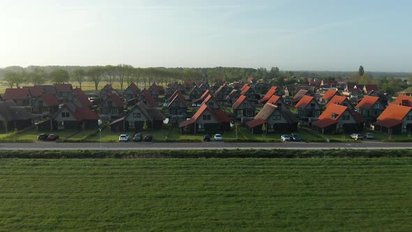 Beautiful Green Landscape With Rows Of Water Villas In Waterstaete Ossenzijl Holiday Park, Friesland alt